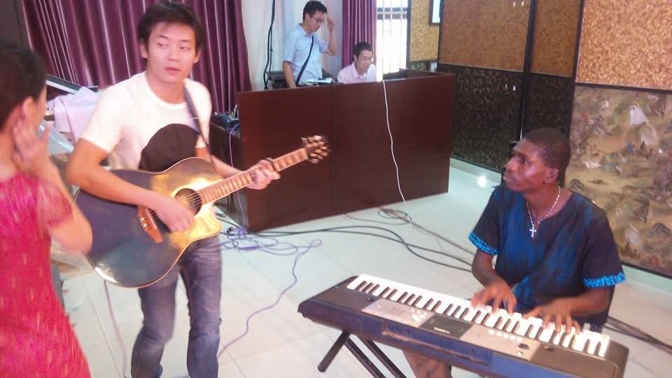 Keyboard and guitar rehearsal session