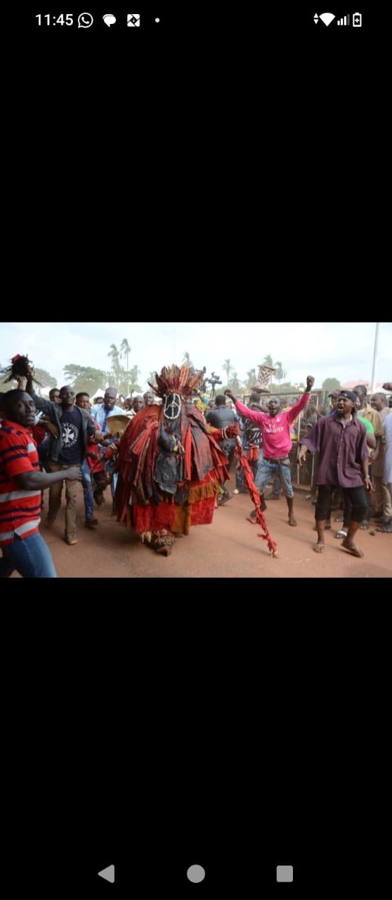 Masquerade procession — traditional cultural festival